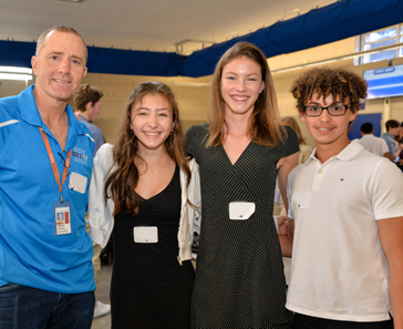 Students with symposium speaker
